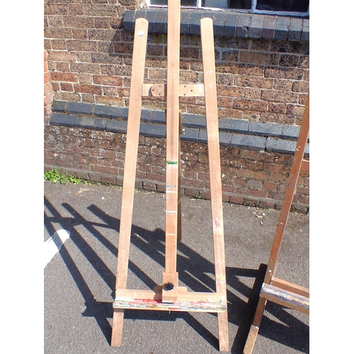 54 - AN ARTISTS' STUDIO EASEL

60cm wide, and another folding easel (2)