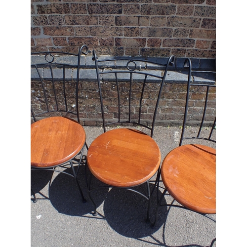7 - A SET OF FOUR SCROLLED METAL GARDEN/CONSERVATORY CHAIRS

with round wooden seats