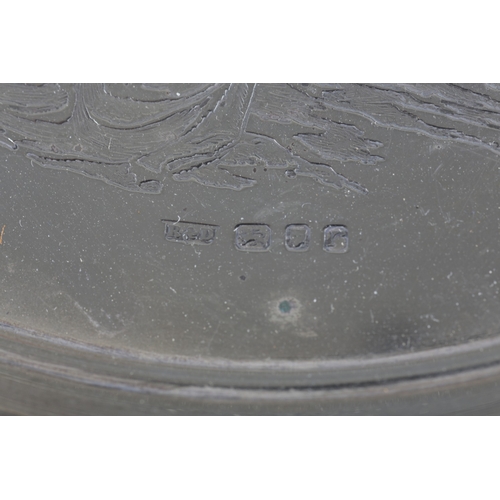 65 - AN ELIZABETH II SILVER WAITER

by Roberts & More, London 1972, engraved with Britannia, Queen Victor... 