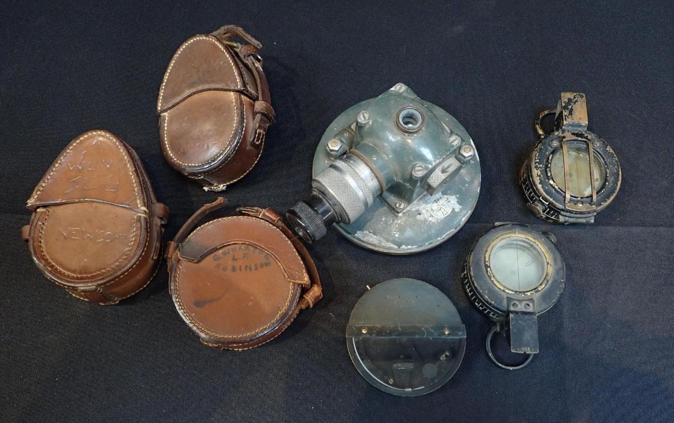 WWII COMPASS WITH A SIMILAR two leather compass cases dated 1931 and ...
