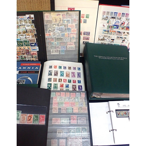 A LARGE COLLECTION OF STAMPS IN FIFTEEN ALBUMS OR STOCKBOOKS in packets ...