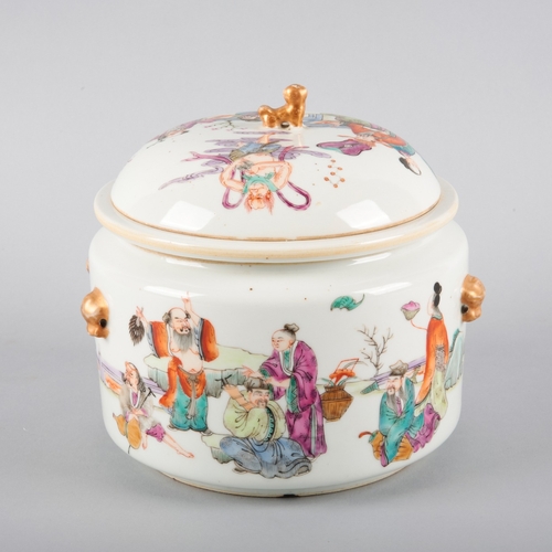 104 - A CHINESE PORCELAIN FAMILLE ROSE WARMING BOWL AND COVER

19th/20th century, the domed lid with lion ... 