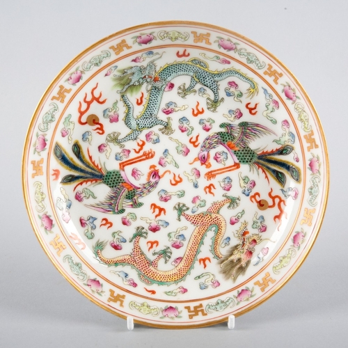 132 - A PAIR OF CHINESE FAMILLE ROSE PORCELAIN DISHES

bearing a Daoguang six character mark, the interior... 