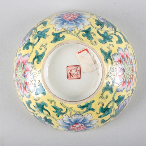 171 - TWO SIMILAR CHINESE PORCELAIN FAMILLE ROSE BOWLS

the yellow ground bowl with a four character 'Shen... 