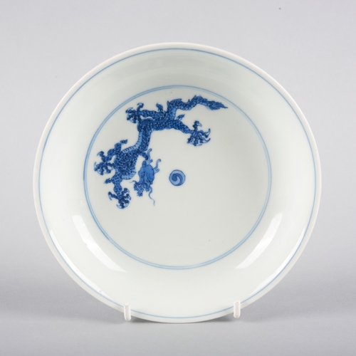 79 - A CHINESE BLUE AND WHITE PORCELAIN DISH

bearing a six-character Kangxi mark, the interior decorated... 
