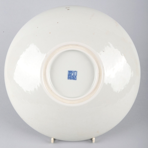 82 - A CHINESE PORCELAIN BLUE AND WHITE BOWL

bearing a six character Yongzheng mark to the base, late 19... 