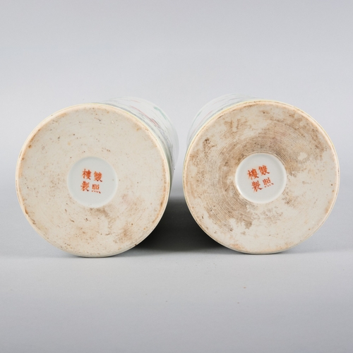 97 - A PAIR OF CHINESE PORCELAIN CYLINDER VASES OR HAT STANDS

each bearing four character marks to the b... 