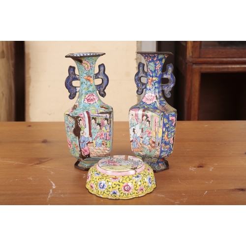 47 - A MATCHED PAIR OF CHINESE ENAMELLED METAL TWO HANDLED VASES

probably early 20th century, each decor... 