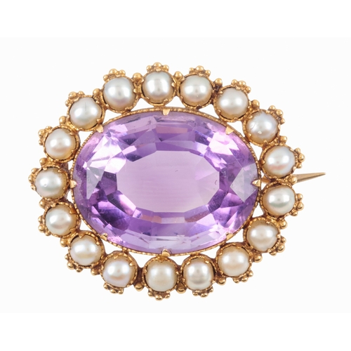 172 - A VICTORIAN AMETHYST AND SPLIT PEARL BROOCH

the oval mixed cut amethyst c. 19mm x 15mm, surrounded ... 