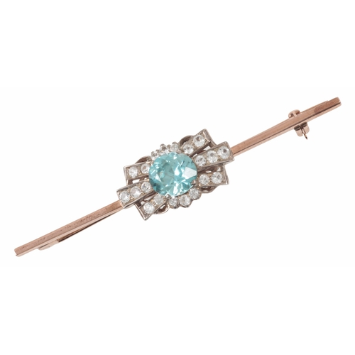 181 - A BLUE ZIRCON WHITE SAPPHIRE BAR BROOCH

the round mixed cut zircon set with radiating set white sap... 