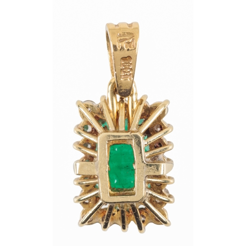 277 - AN EMERALD AND DIAMOND PENDANT

the emerald 8mm x 5mm, within a border of twenty brilliant-cut diamo... 
