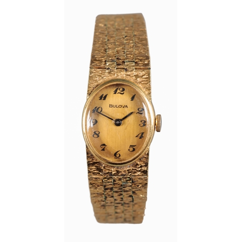 505 - BULOVA: A GOLD PLATED WRISTWATCH

with quartz movement, gold dial, black Arabic numerals, dark blue ... 