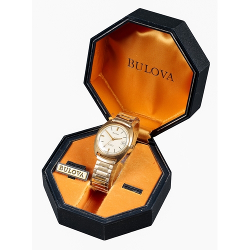 506 - BULOVA: A 9CT GOLD WRISTWATCH

in its original Bulova watch box and outer box, with automatic moveme... 