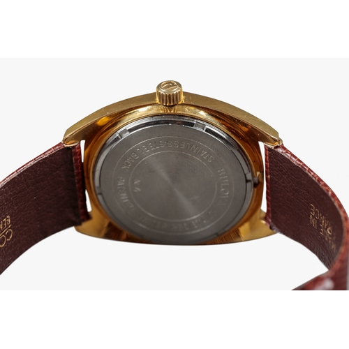 507 - BULOVA ACCUTRON: A GOLD-PLATED WRISTWATCH

with gold dial, gold and black baton numerals, date apert... 