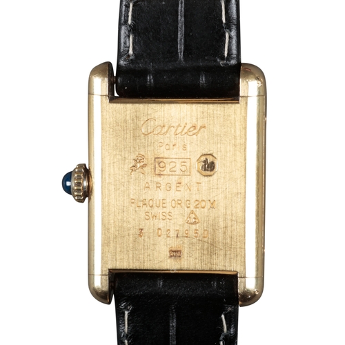 509 - CARTIER: A LE MUST DE CARTIER SILVER GILT WRISTWATCH

with manual wind movement, black dial, silver ... 