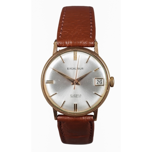 516 - EXCALIBUR: A 9CT GOLD WRISTWATCH

with automatic movement, silver dial, gold baton numerals, gold ha... 