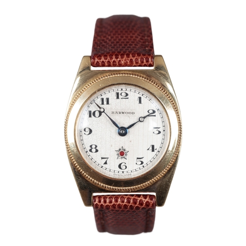 527 - HARWOOD: AN 18CT GOLD WRISTWATCH

with manual wind movement, silver dial, black Arabic numerals, dar... 
