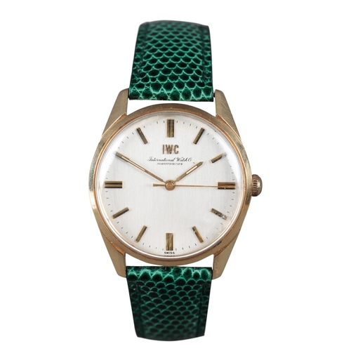 529 - IWC: A GOLD-PLATED WRISTWATCH

with manual wind movement, silver dial, gold baton numerals and hands... 