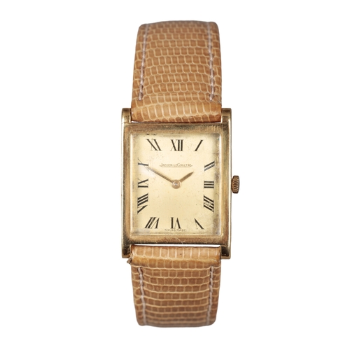 530 - JAEGER-LECOULTRE: AN 18K GOLD WRISTWATCH

with manual wind movement, gold dial, black Roman numerals... 