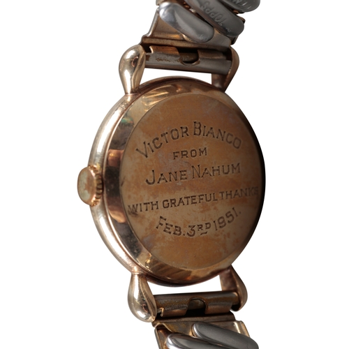 533 - JAEGER-LECOULTRE: A 9CT GOLD WRISTWATCH

with manual wind movement, white dial, gold Arabic numerals... 