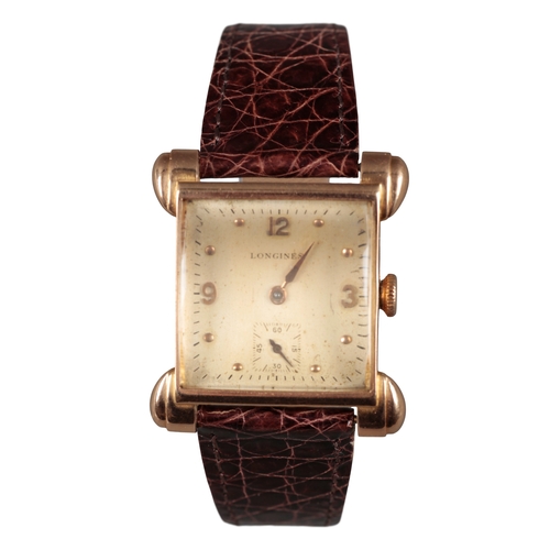 536 - LONGINES: AN 18CT GOLD WRISTWATCH

with manual wind movement, gold dial, gold Arabic and baton numer... 