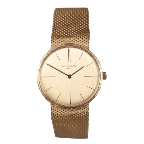 548 - PATEK PHILIPPE: AN 18K GOLD CALATRAVA BRACELET WATCH

with manual wind movement, gold dial, black ba... 
