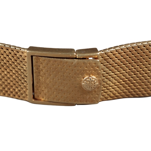 548 - PATEK PHILIPPE: AN 18K GOLD CALATRAVA BRACELET WATCH

with manual wind movement, gold dial, black ba... 