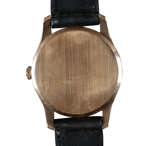 554 - RECORD: A 9CT GOLD WRISTWATCH

with manual wind movement, silver dial, gold Arabic numerals, gold ha... 
