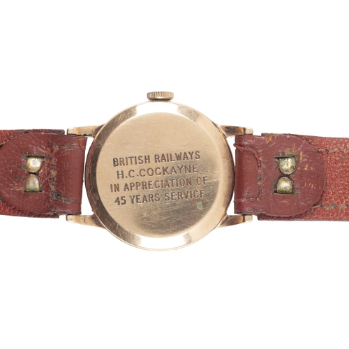 569 - SMITHS DELUXE: A 9CT GOLD WRISTWATCH

with manual wind movement, silver dial, subsidiary seconds dia... 