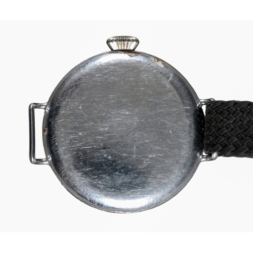 582 - A NICKEL PLATED TRENCH WATCH

with manual wind movement, white enamel dial, subsidiary seconds dial,... 