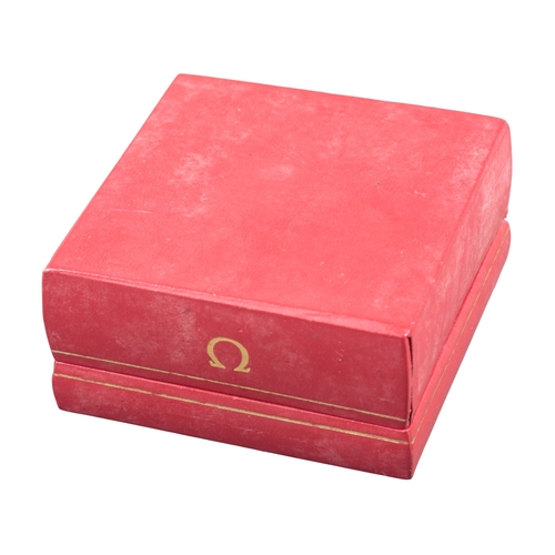 589 - OMEGA: A RED LEATHERETTE WATCH BOX

with white silk lining, circa 1980s, 5cm x 10cm