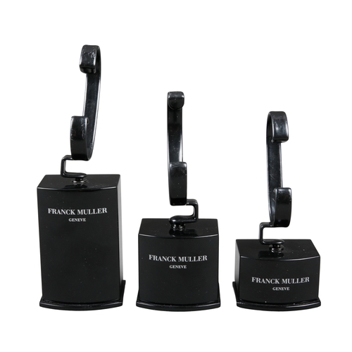 590 - FRANCK MULLER OF GENEVA: TWELVE SHOP WATCH DISPLAY STANDS

of various sizes, old shop stock (12)