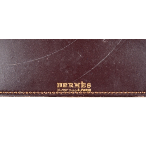 633 - PAUL DUPRE-LAFON (1900-1971) FOR HERMES: A 1930S OXBLOOD LEATHER DESK SET

comprising pad, 55cm x 36... 