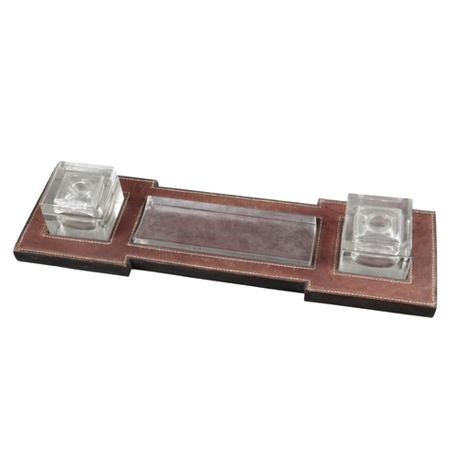 633 - PAUL DUPRE-LAFON (1900-1971) FOR HERMES: A 1930S OXBLOOD LEATHER DESK SET

comprising pad, 55cm x 36... 