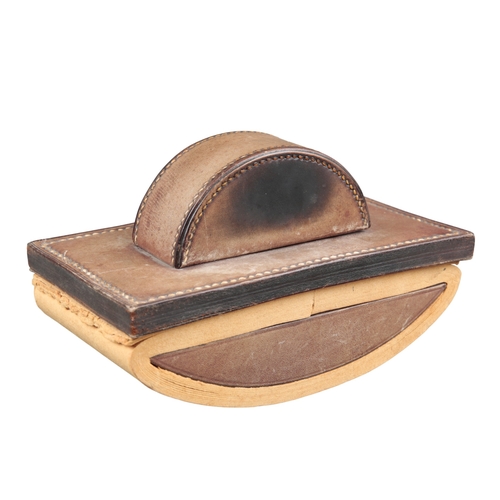 633 - PAUL DUPRE-LAFON (1900-1971) FOR HERMES: A 1930S OXBLOOD LEATHER DESK SET

comprising pad, 55cm x 36... 