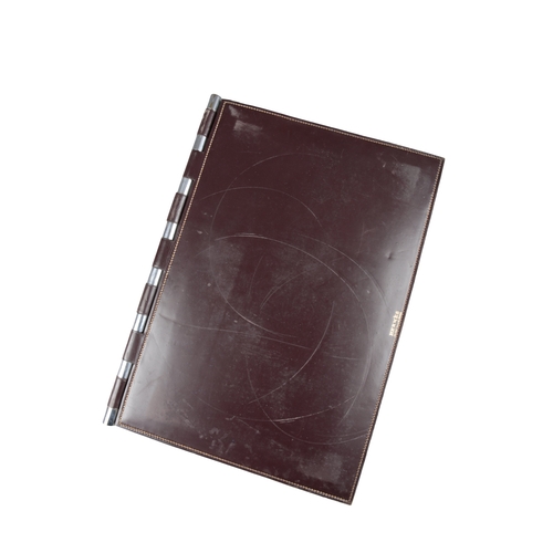 633 - PAUL DUPRE-LAFON (1900-1971) FOR HERMES: A 1930S OXBLOOD LEATHER DESK SET

comprising pad, 55cm x 36... 