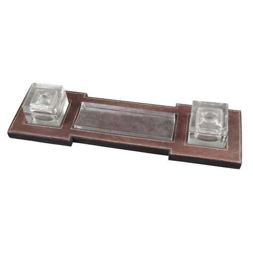 633 - PAUL DUPRE-LAFON (1900-1971) FOR HERMES: A 1930S OXBLOOD LEATHER DESK SET

comprising pad, 55cm x 36... 