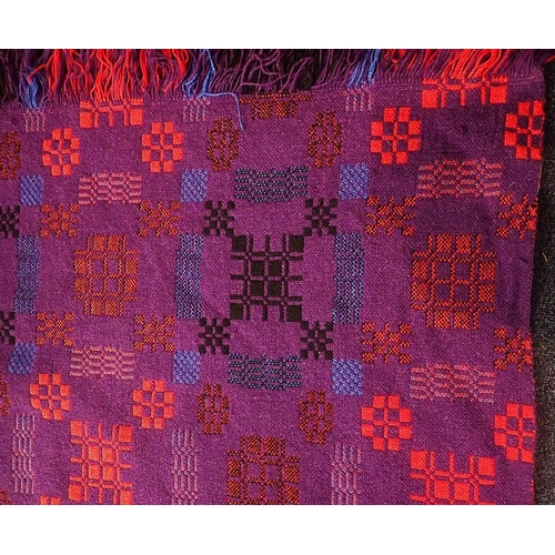 A 'HOLYTEX' WELSH BLANKET, IN RICH RED, BLUE AND PURPLE circa 1960 ...