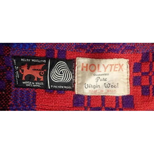A 'HOLYTEX' WELSH BLANKET, IN RICH RED, BLUE AND PURPLE circa 1960 ...