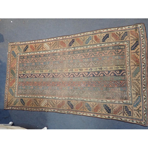 617 - A RUG, OF GEOMETRIC DESIGN

with 10 columns of decoration to the central panel, zig-zagging faded or... 