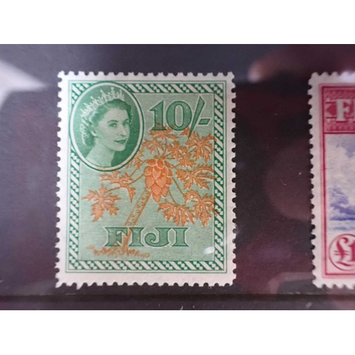 462 - ENVELOPE WITH FIVE COMPLETE MINT STAMP SETScomprising Bahamas, British Guyana, Dominica, and Fiji... 