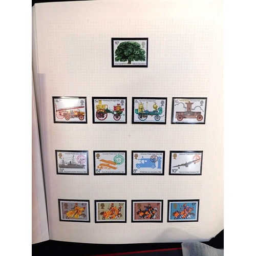 483 - A LARGE QUALITY GREEN ALBUM AND SLIPCASEtogether with three other stock books with Commonwealth/GB s... 