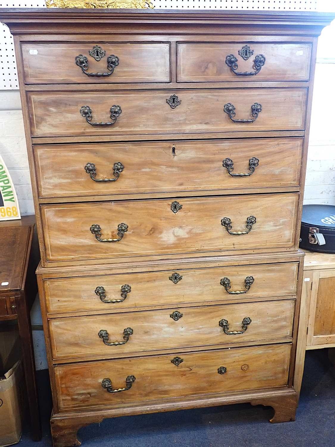 A GEORGE III MAHOGANY CHEST ON CHESTwith string inlay, and Rococo style ...