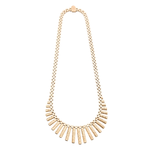 147 - A 1970S 9CT GOLD FRINGE NECKLACE the graduated textured links suspended from the brick-link necklace... 