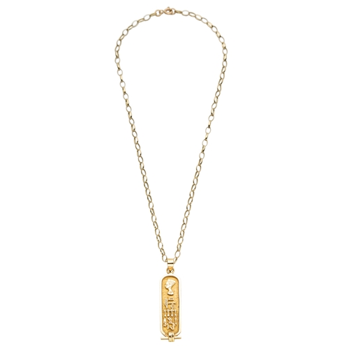165 - AN EGYPTIAN PENDANT ON CHAIN the pendant with 48mm drop, unmarked, surface testing as 18ct, on a cha... 