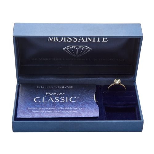 173 - A MOISSANITE SOLITAIRE RING the four claw set round brilliant cut moissanite approximately 7.2mm dia... 