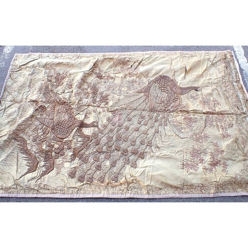 62 - AN EMBROIDERED SILK BEDSPREADwith other textiles