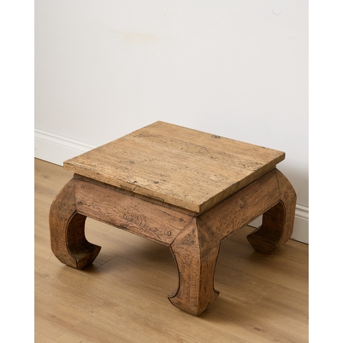 198 - A DISTRESSED STAINED PINE OPIUM TABLE the rectangular top over bold bombe-shaped legs, 44cm high x 7... 