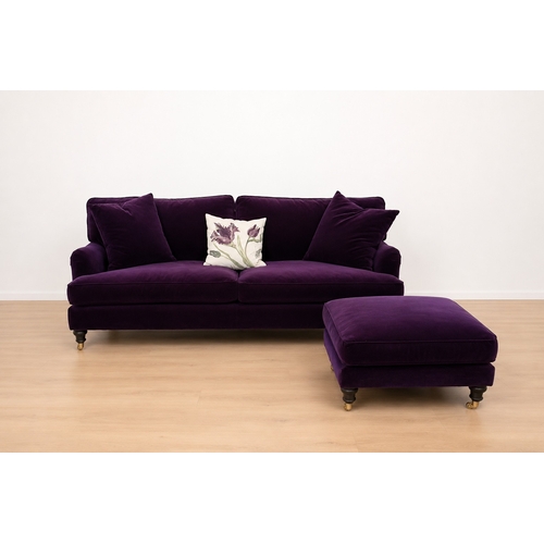 60 - SOFA.COM: A THREE SEAT 'BLUEBELL' SOFA upholstered in purple velvet, rising on turned mahogany legs ... 