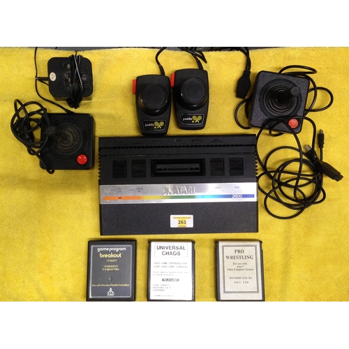 261 - Atari system Inc controller s and games